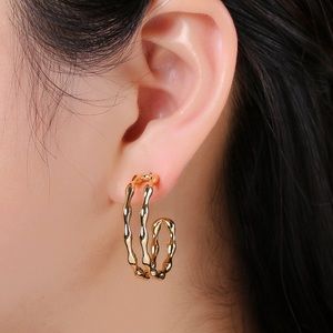 Eternity Design Gold Stud Earrings